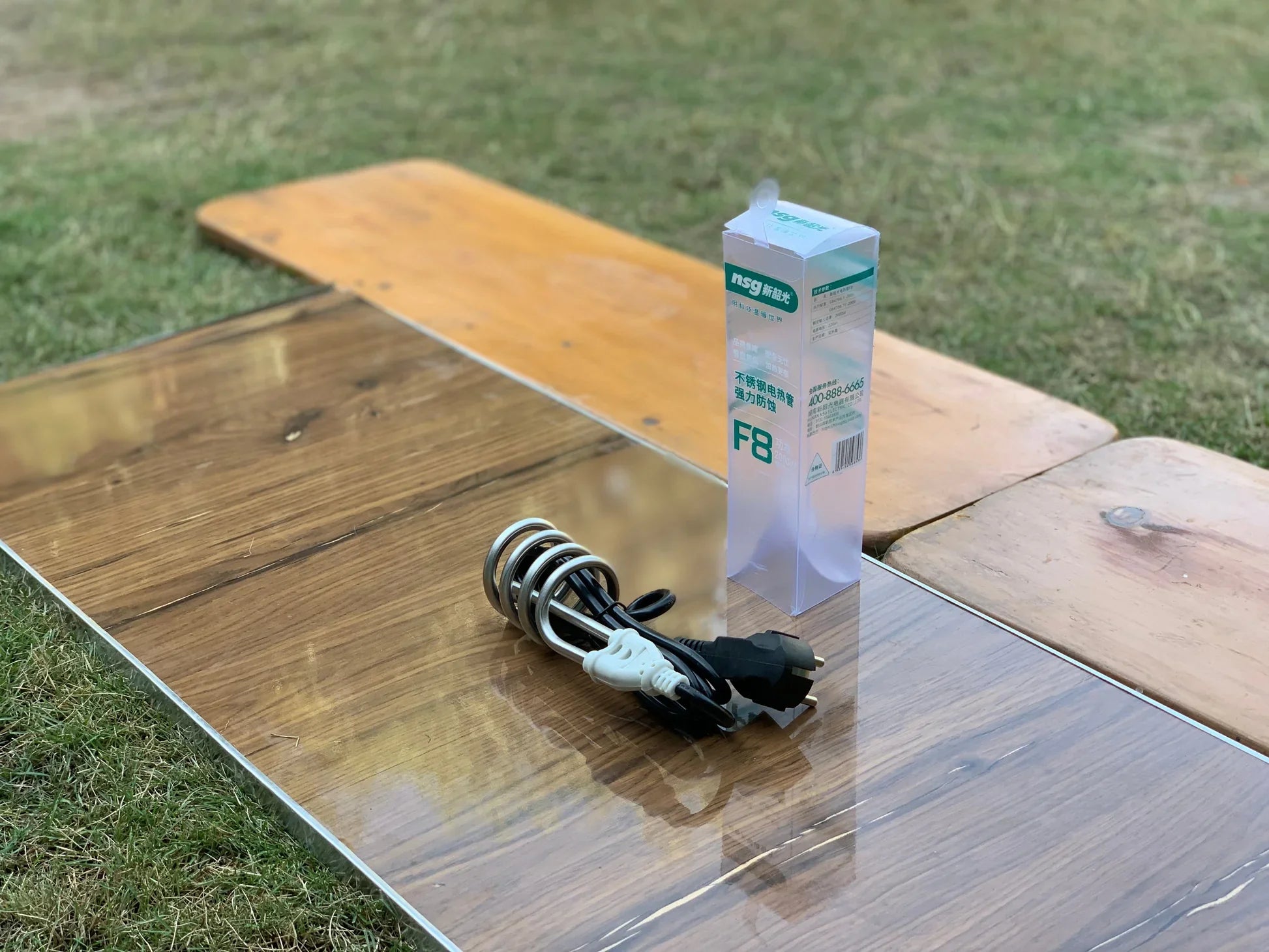 Packaged electronic component on a wooden surface outdoors